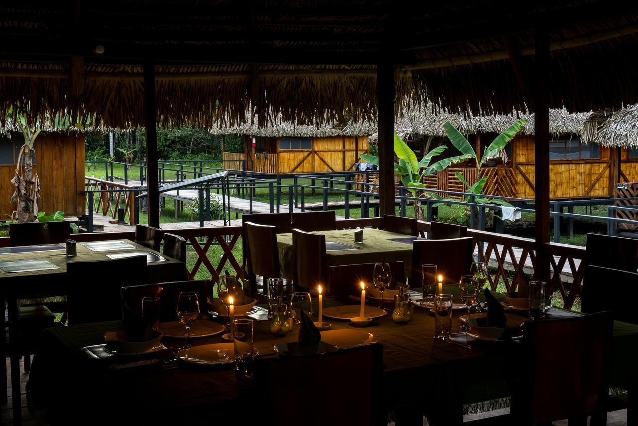 Green Forest Ecolodge Puerto Montufar Bagian luar foto