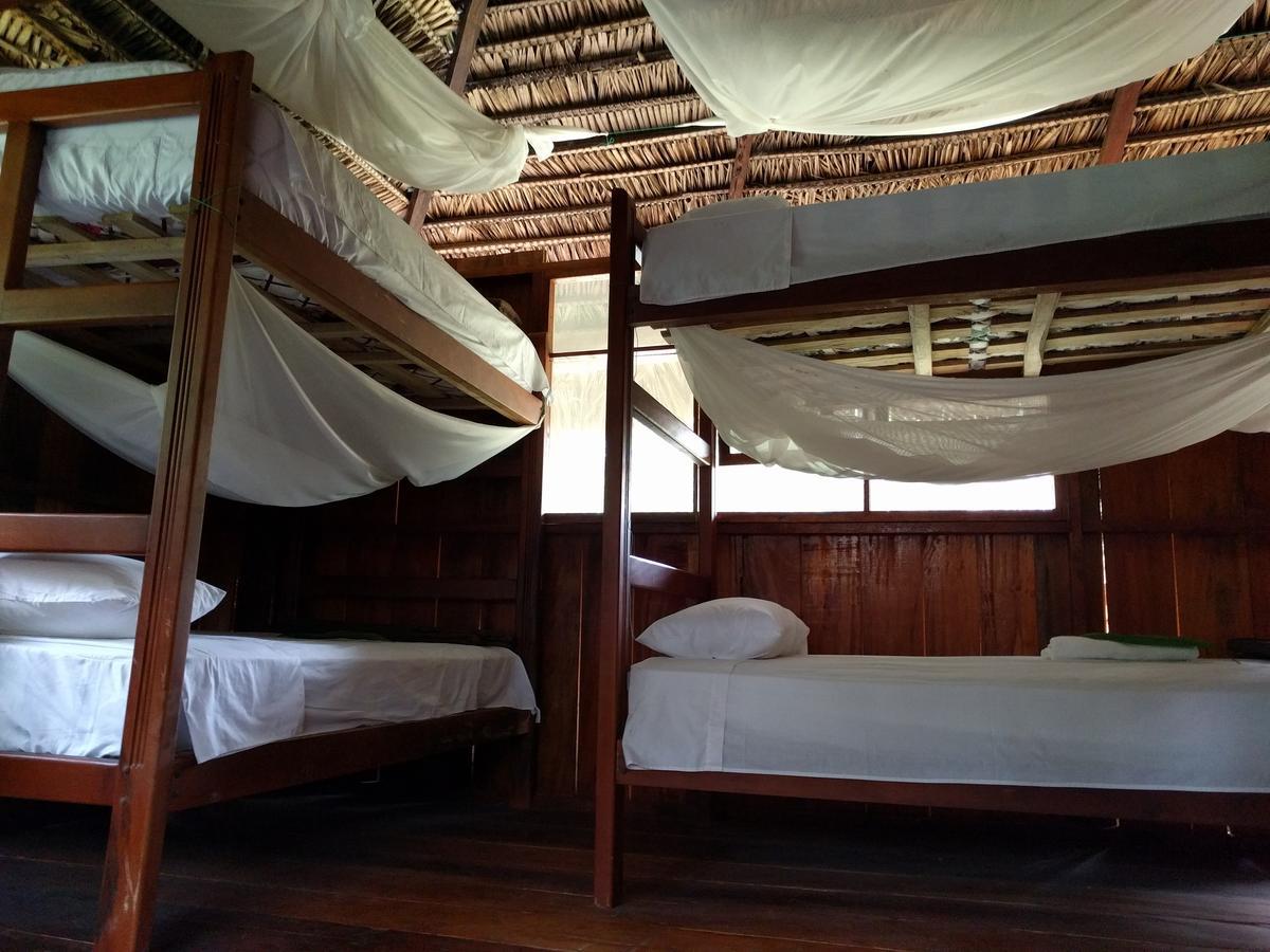Green Forest Ecolodge Puerto Montufar Bagian luar foto