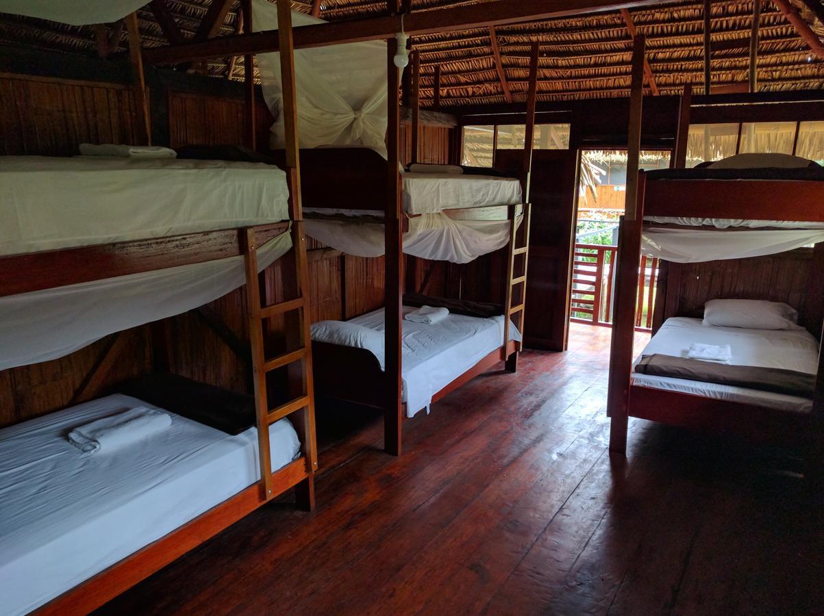 Green Forest Ecolodge Puerto Montufar Bagian luar foto