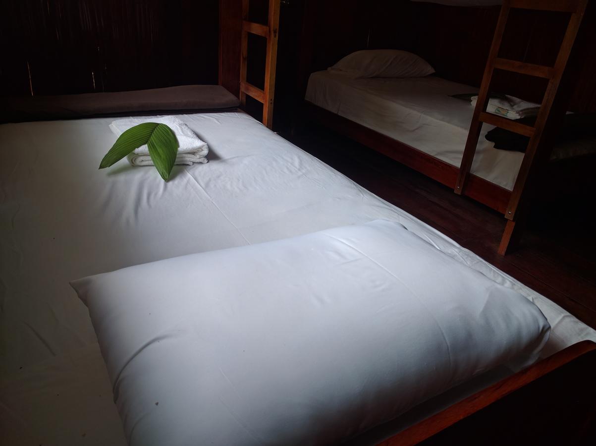 Green Forest Ecolodge Puerto Montufar Bagian luar foto