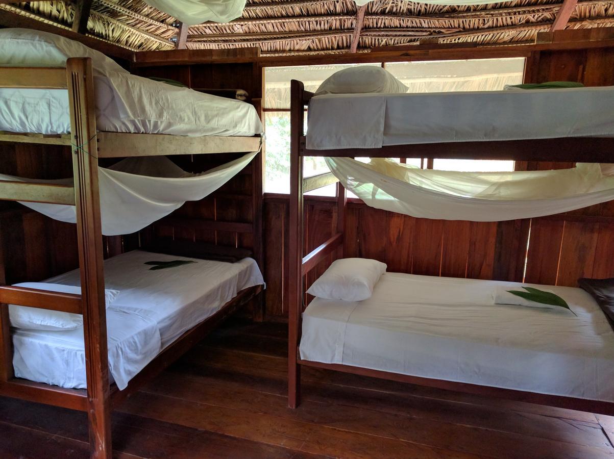 Green Forest Ecolodge Puerto Montufar Bagian luar foto