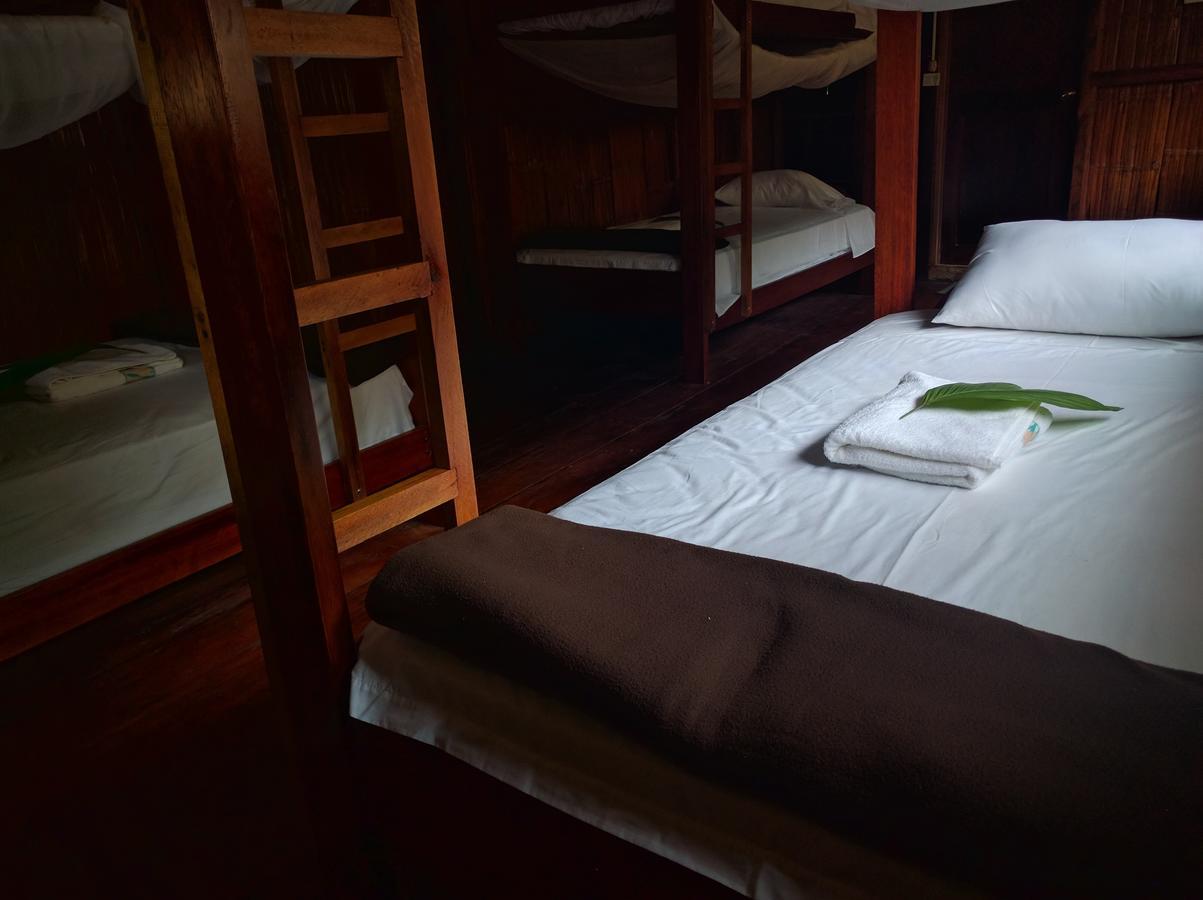 Green Forest Ecolodge Puerto Montufar Bagian luar foto