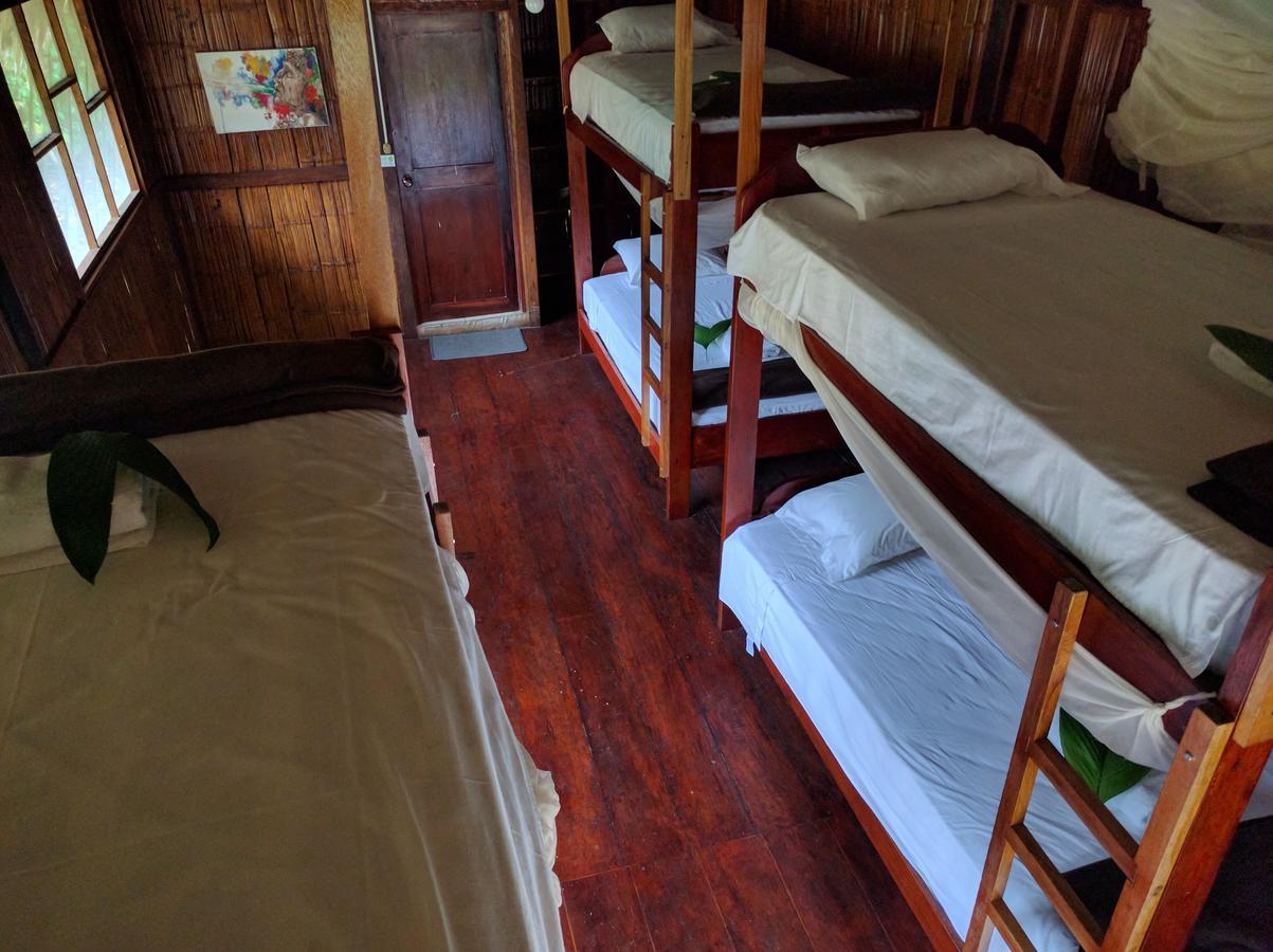 Green Forest Ecolodge Puerto Montufar Bagian luar foto